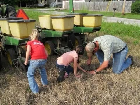 alt John Deere 7000 corn planter planting pumpkins